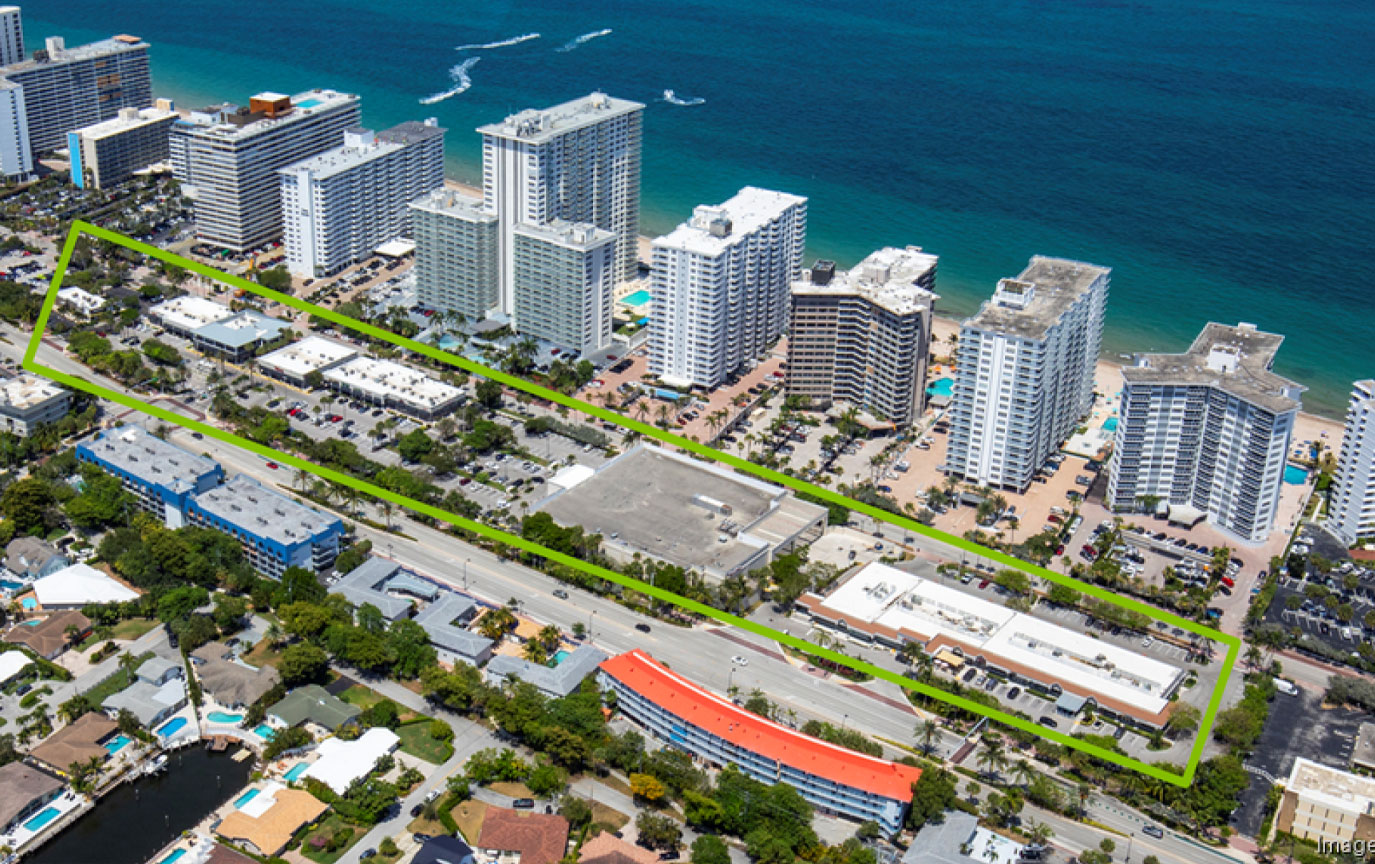 Aerial view of beachfront retail and residential buildings in Fort Lauderdale, outlined in green
